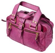 A vintage Mulberry hot pink leather handbag