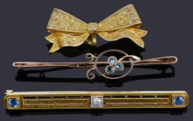 Three gold brooches