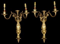A pair of early 20th century French Empire style three light ormolu wall appliques