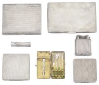 A collection of mid 20th century engine turned silver items to include