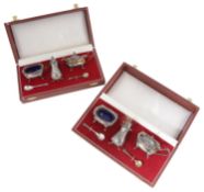 Two modern silver three piece cruet sets