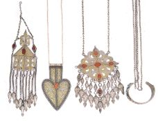 Three assorted silver Turkmen yomud pendants