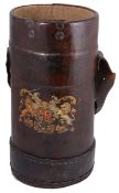 An early 20th century leather artillery shell carrier