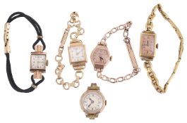 An assortment of gold watch heads on bracelets