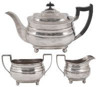 A George V silver three piece tea service