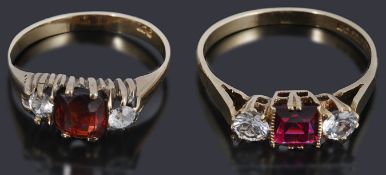 Two 9ct gold three stone rings