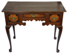 A mid 18th century oak and walnut crossbanded low boy