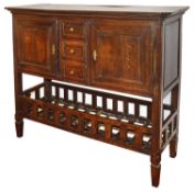 An early 19th century French provincial oak kitchen dresser