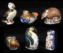 A collection of Royal and Crown Derby animal paperweights