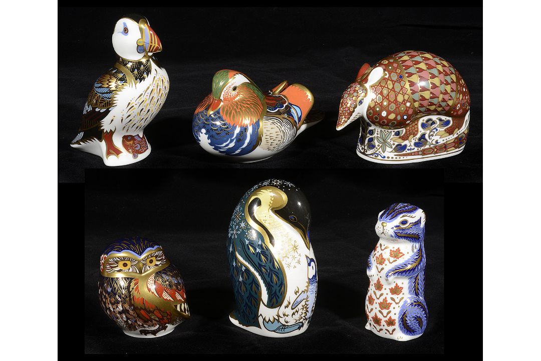 A collection of Royal and Crown Derby animal paperweights - Image 1 of 4