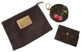 Louis Vuitton canvas pouch, a Louis Vuitton circular cherry coin purse and a Louis Vuitton wallet