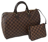 A Louis Vuitton Damier Ebene canvas speedy 35 handbag,