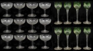 Set of early 20th c cut glass champagne coupes; set of Bohemian green flashed cut glass hock glasses
