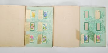 A collection of silk trade / cigarette cards from Kensitas Flowers small series one (1) across two