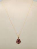 A 9ct gold amethyst and rodalite pendant 9ct gold necklace set to a rope twist mesh chain,