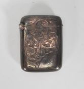 A 19th century Victorian silver hallmarked vesta case being chase decorated with hallmarked top (