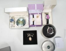 A collection of five unused boxed ladies dress wristwatches to include examples by Mini, Limit