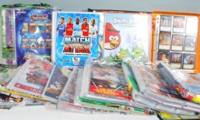 A large collection of mixed trade cards in collectors albums to include topps; Marvel Avengers,