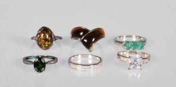 A collection of silver 925 dress rings to include a Zambian emerald and white topaz size R ring, a
