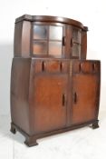 A 1930’s Art Deco dark oak  bow fronted sideboard display cabinet with half moon display cabinet