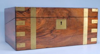 A 19th Century Georgian walnut and brass bound writing slope of large rectangular form with square