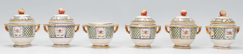 A collection of six early 20th Century French ceramic lidded pot / apple sauce / preserve jars