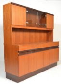 A vintage retro G Plan red label teak wood tall storage unit, the sideboard having two drawers and