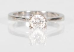 A hallmarked 950 platinum diamond solitaire ring. The ring being set with a round brilliant cut