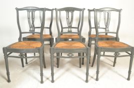 A set of six 19th Century shabby chic grey painted mahogany splat back dining chairs, drop in rattan