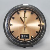 A vintage Citizen transistor wall clock from the 70s, baton markers with day and datejust, fitted