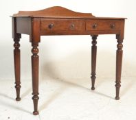 An 19th Century Victorian mahogany side table / writing table, gallery surround with fitted frieze
