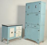 A vintage mid 20th Century kitchen unit having flared enamel work top over a bank of three drawers