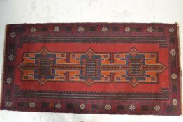 A hand knotted woolen Herati Baluchi carpet floor rug, central panel with traditional motif and
