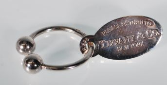 A 20th century Sterling silver Tiffany & Co Keyring © 2001 Tiffany & Co. Stamped STER 925. Total