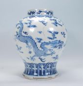 A late 18th / early 19th Century Chinese blue and white glazed bulbous baluster kangxi vase, the