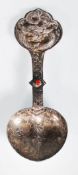 A late 19th / early 20th Century Chinese silver spoon having repousse dragon decorated handle with