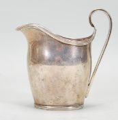 An Antique Edwardian Sterling Silver Creamer Jug with monogram reading 