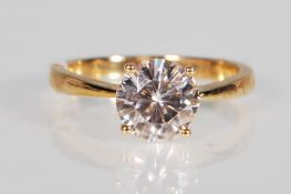 A ladies 9ct gold hallmarked solitaire prong set single white stone dress ring. Size P weighing 2.