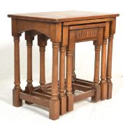A good quality oak Jacobean revival nest of tables in the manner of Old Charm / Jaycee being