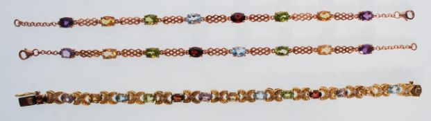 A collection of 3 silver gilded 925 line bracelets each with multiple coloured facet cut stones. All