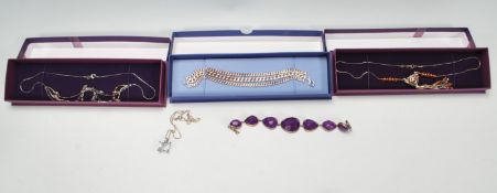 A silver 925 trilogy curb link bracelet together with a silver 925 pendant necklace, the pendant