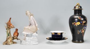 A collection of 20th Century ceramics to include a 1930's Carlton Ware lidded baluster vase having a