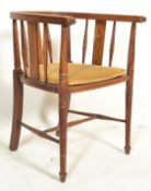 An early 20th Century Edwardian inlaid mahogany tub shaped splatback corner chair, upholstered seat,