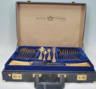 A 20th Century Bestecke Solingen canteen of gold plated cutlery for twelve complete in the canteen