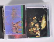 An album of lenticular holographic postcards, subjects include; novelty, famous works of art,