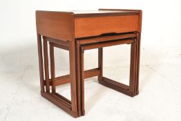 A 1960's retro vintage G-Plan teak wood nest of tables of graduating sizes. The largest table having