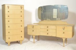 A mid century bleached oak wood bedroom suite comprising a pedestal seminaire chest of drawers