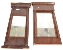 A near pair of 19th century continental Biedermeier wall mirrors. Each with half column uprights