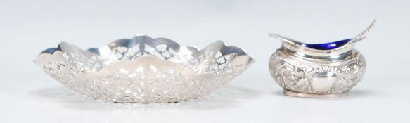 A 20th Century silver hallmarked Adie Brothers bon bon dish having a pierced decoration fanned rim