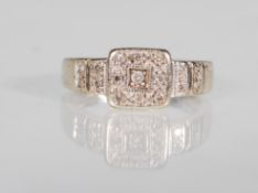 A HALLMARKED 9CT WHITE GOLD & DIAMOND RING